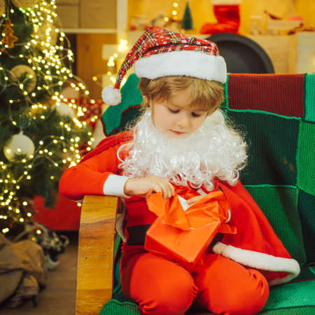 Happy child and Christmas gift.の写真素材