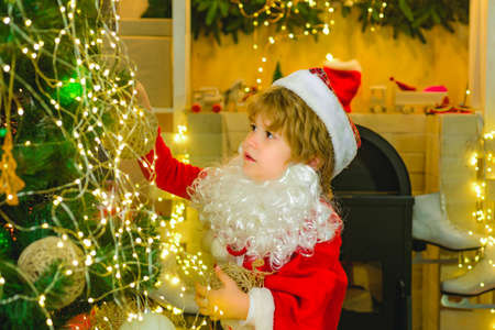 Happy child. Santa Clause costome.の写真素材