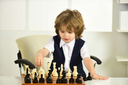 Quarantine Games. Chess. Boy and a chessboard.の写真素材