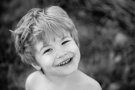 Happy portrait of a boy. A cute child. Baby face.の写真素材