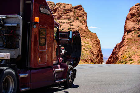 Arizona, USA - 2020: American trucks in mountains. Roads in the United States, delivery of goods. Transport business.の写真素材