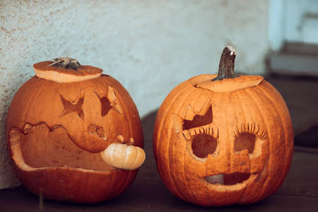 Carving pumpkins. Scenery for Halloween in October. Decoration in the yard.の写真素材