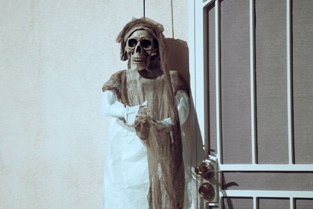 Death in a wedding dress. Scenery for Halloween in October. Decoration in the yard.の写真素材