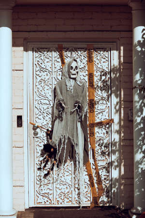 Death and crime at the front door. Scenery for Halloween in October. Decoration in the yard.の写真素材