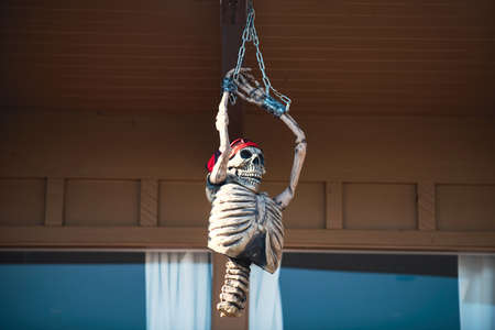Pirate skeleton in handcuffs. Scenery for Halloween in October. Decoration in the yard.の写真素材
