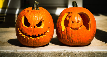 Carving pumpkins. Scenery for Halloween in October. Decoration in the yard.の写真素材
