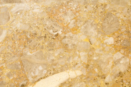 Golden colored marble texture Ideal for web and print design. Great for sites, calendares, banners, brochures.の写真素材