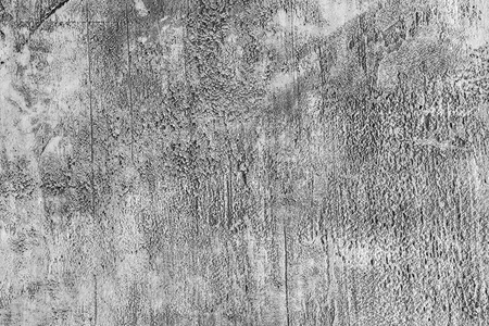 Concrete texture background. Wall with cement and concrete. Visible smudges and dirty surface. Many hollows and roughness.の写真素材
