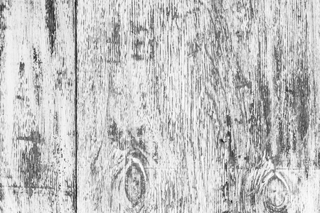Black and white old wooden surfase. Contrast wood background. Contrast relief surface. Heterogeneous drawing textures. Wood fibers are arranged vertically.の写真素材