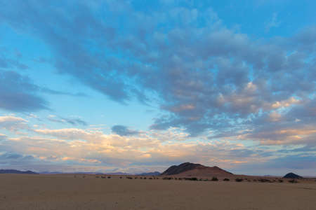 Sunrise color clouds different colors in Namib Desert Namibiaの写真素材