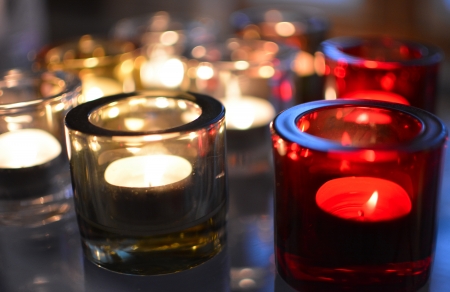 Candles and lights on a tableの写真素材