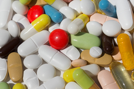 Many colored pills / capsules / tablets - medical backgroundの写真素材