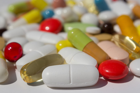 Many colored pills / capsules / tablets - medical backgroundの写真素材