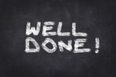 well done text on chalkboardの写真素材