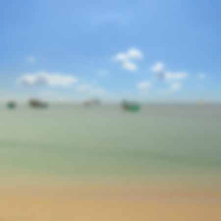 Summer beach background soft focus oceanview blue sky and boatsの写真素材