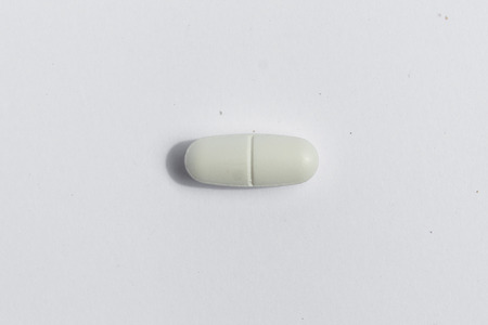 white pill isolatedの写真素材