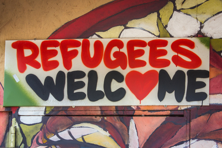 Refugees welcome graffiti signの写真素材