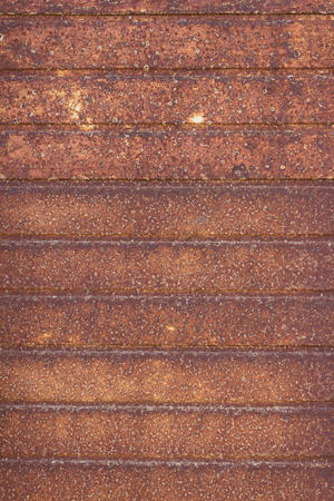 aged rusted metal - striped rusty background - old garage door