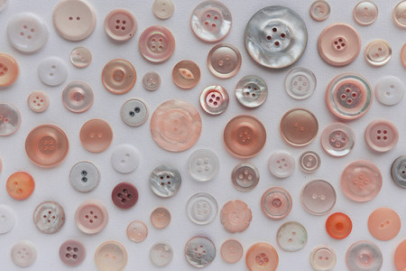 colorful button collection on white background - fashion pattern background