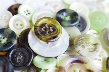 colorful button collection on white background