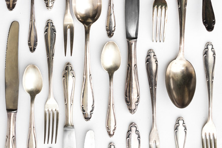 beautiful sterling cutlery collection on white backgroundの写真素材