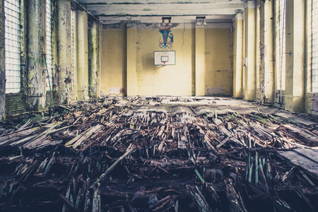 old basketball sports hall , abandoned school  - vintage photoの写真素材