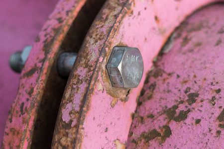metal screw closeup of an old pipelineの写真素材