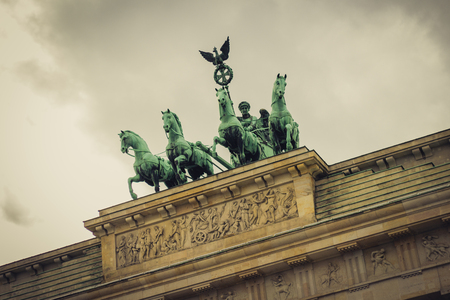Quadriga - Top of the brandenburg gate (Brandenburg Gate) in Berlin - retro style photoのeditorial素材