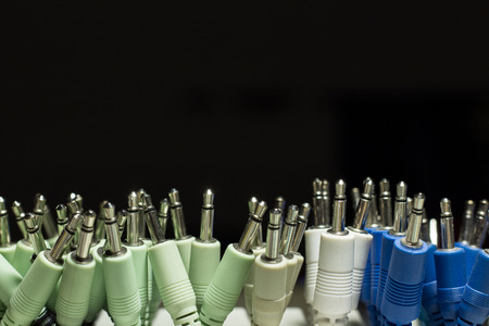 colorful audio cables macro on black backgroundの写真素材