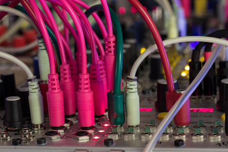 audio cables in music studio - modular synthesizer, analogue synth closeup