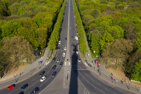 street from above with shadow of the victory column in Berlinの写真素材
