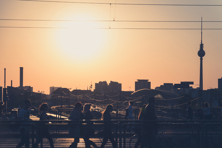 people, berlin skyline and tv tower at sunsetのeditorial素材