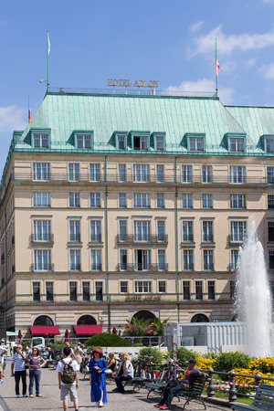 People outdoor the Hotel Adlon in Berlin. It is part of the Kempinski group and the most famous hotel in Berlin.のeditorial素材