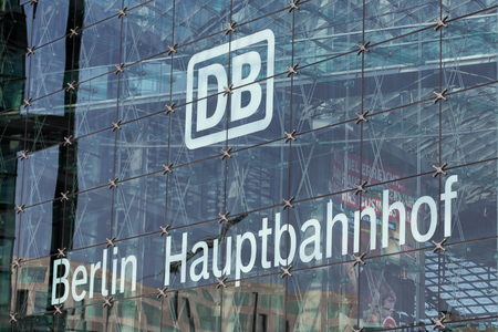 Berlin, Germany - September 9, 2016: German railway logo "DB" (Deutsche Bahn) on glass facade of Berlin main train station (Berlin Hauptbahnhof).のeditorial素材