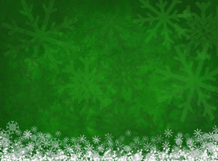 white snowflakes on green christmas backgroundの写真素材