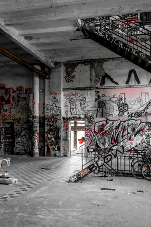Empty room in abandoned factory ruin - run down buildingの写真素材