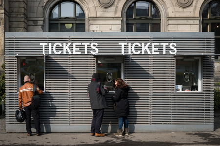People buying tickets at ticket counter in front of the Natural History Museum (Humboldt Museum) in Berlin.のeditorial素材