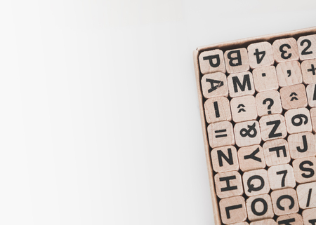 letters and numbers on wooden cubes - communication conceptの写真素材