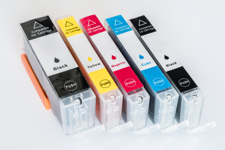 ink cartridge  isolated on white background  - cmykの写真素材