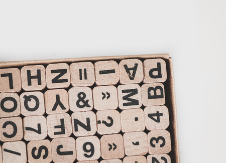 letters and numbers on wooden cubes - communication conceptの写真素材