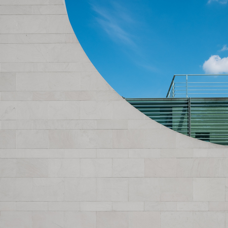 modern building feature with blue sky background and balconyの写真素材