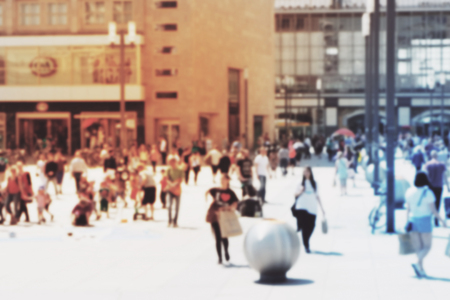 People walking on busy street / city square - blurryのeditorial素材