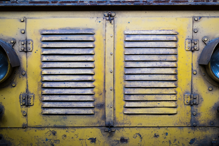 metal doors / front grill of an old locomotive - historic railroadの写真素材