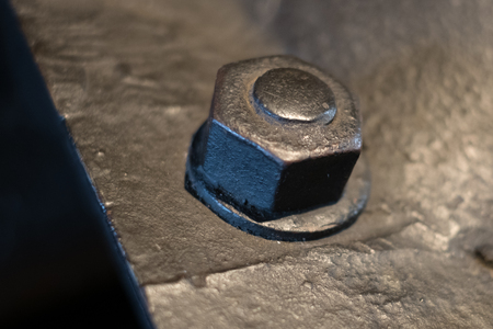 bolt and nut closeup on metral background,の写真素材