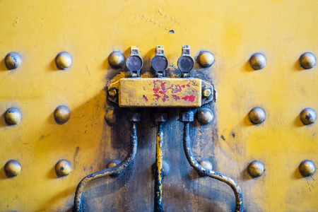 industrial metal background with three connecting devices - copy spaceの写真素材