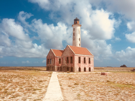 Beautiful landscape, blue sky and old lighthouse tower  on Klein Curacao Islandの写真素材