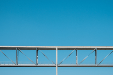 elevated pedestrian walkway / bridge on blue sky - concrete overpass -