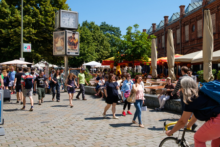 People on street market at Hackescher Markt in Berlin, Mitte on a sunny summer dayのeditorial素材