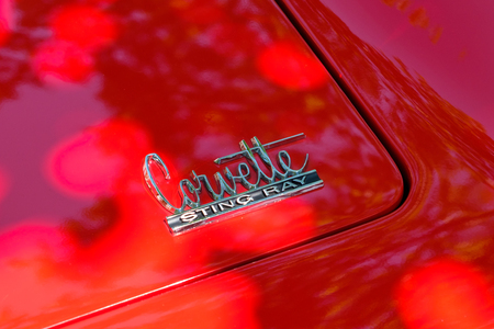 Car design detail and CORVETTE STINGRAY logo / brand name closeup at Oldtimer automobile event in Berlin, Germanyのeditorial素材