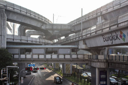 Bangkok, Thailand - January 2014: Cityscape of Bankgok City center road traffic with sky train...